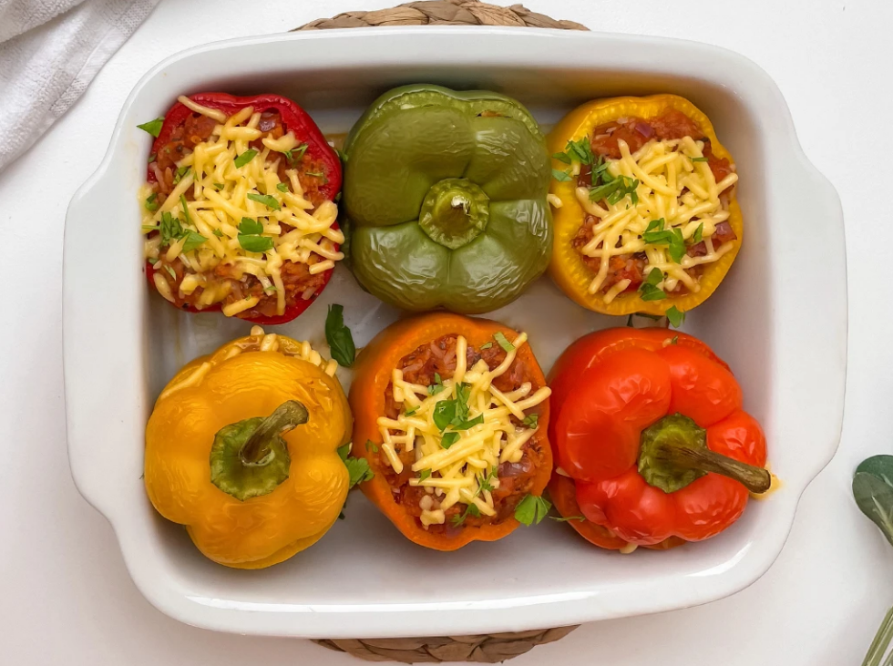 Barbecue vegetarian stuffed peppers with vegan sausages